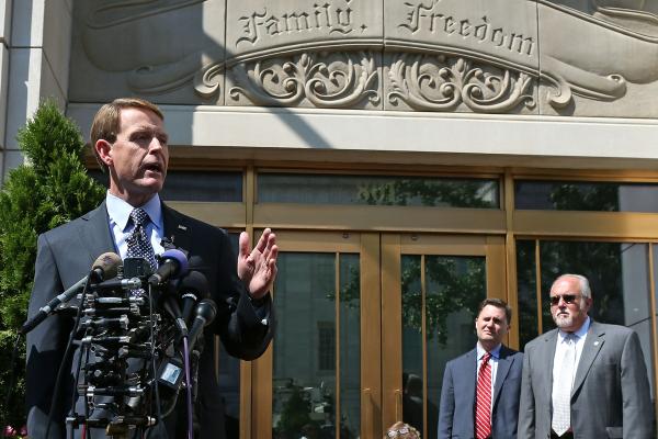 Perkins speaks to reporters outside FRC's headquarters in Washington, D.C.
