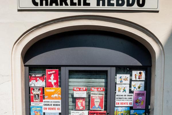 A Charlie Hebdo building with cartoons on the doors. Photo courtesy Brigitte Dja
