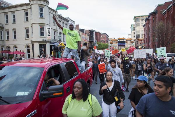 Crowds in DC march in solidarity with protests in Baltimore. Image via JP Keenan