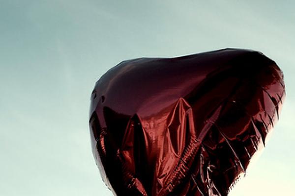 Red heart balloon. Image via Wylio, http://bit.ly/yctzSw.