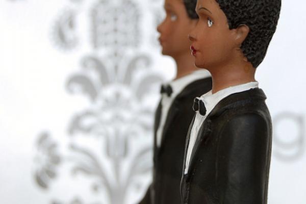 Two grooms wedding cake topper. Image via Wylio, http://bit.ly/x8aDYB.