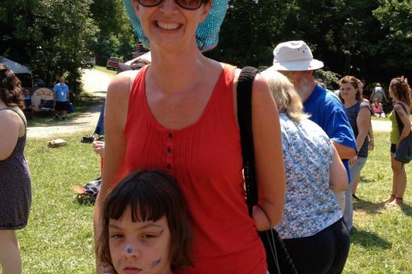 The author and her daughter at Wild Goose 2012. Photo by Jana Riess via Facebook