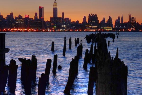 Sunrise over New York City. Image via Wiki Commons (http://bit.ly/HRlswn).