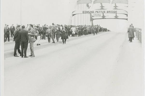 Marchers stopped at Edmund Pettus bridge. Image via Penn State Special Collectio