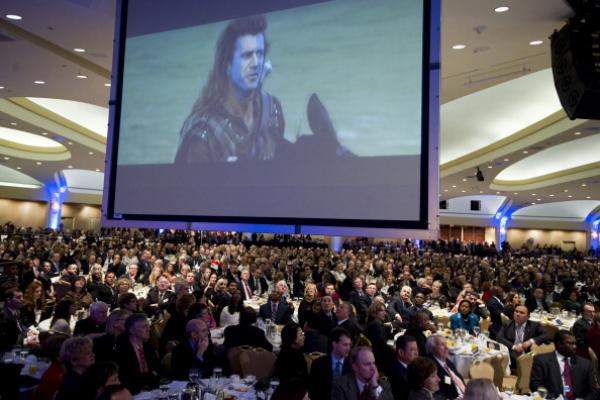 Scene from "Braveheart" is projected at the 2011 National Prayer Breakfast. 