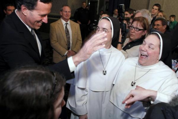 Rick Santorum greets nuns at a Knights of Columbus rally, Feb. 24. Getty Imagesa