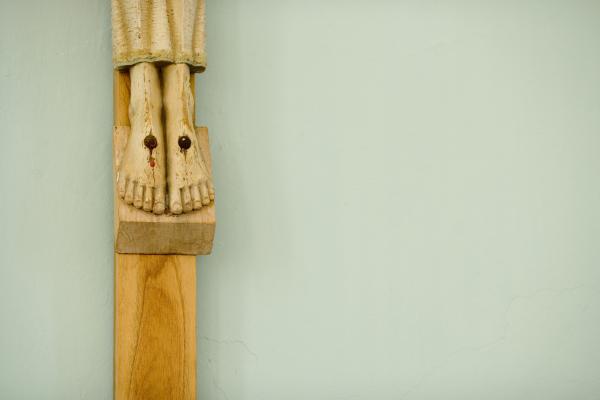 Detail of Christ's feet on the crucifix. Photo by Getty Images. 