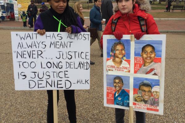 Two young women join the march on Monday January 19. Image courtesy Charissa L