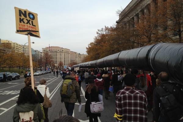 Protestors march to stop the Keystone XL Pipeline. Photo by Scot Degraf