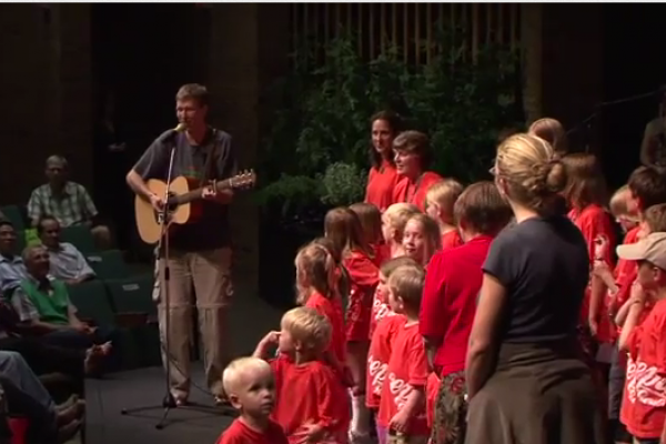 Bryan Moyer leading children in song