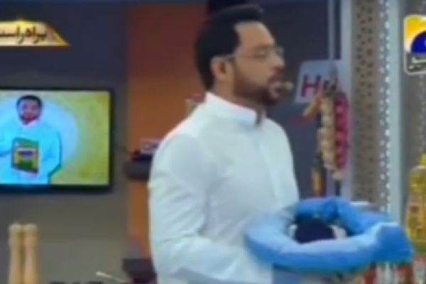 A show in Pakistan is giving away babies. Screenshot of news story from The Guar
