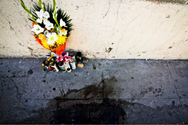 Candles near site of shooting, Murphy Woodhouse 