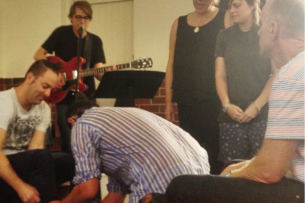 Foot-washing ceremony. Photo courtesy Jarrod McKenna