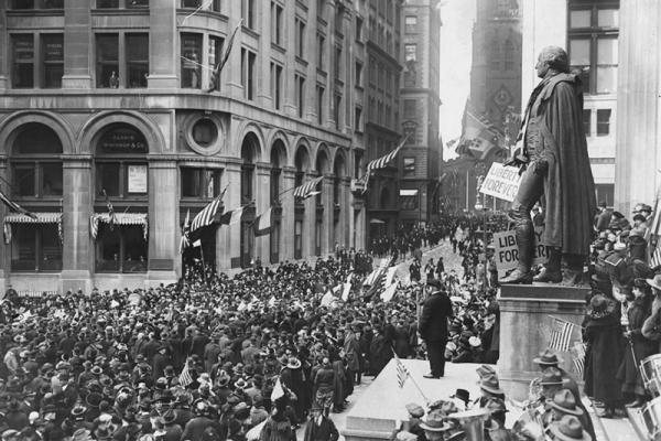 Crowds gather at the Subtreasury building on Wall Street for Armistice Day 1918