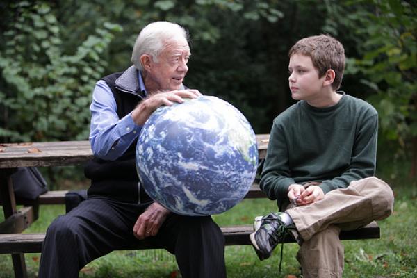 Jimmy Carter with his grandson in 2009. Image via http://bit.ly/zQs4Q4