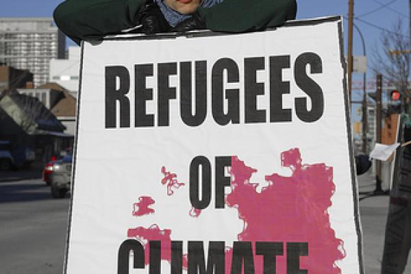 Demonstrator at a climate change rally in Calgary, Canada, 2007. Image via Wylio