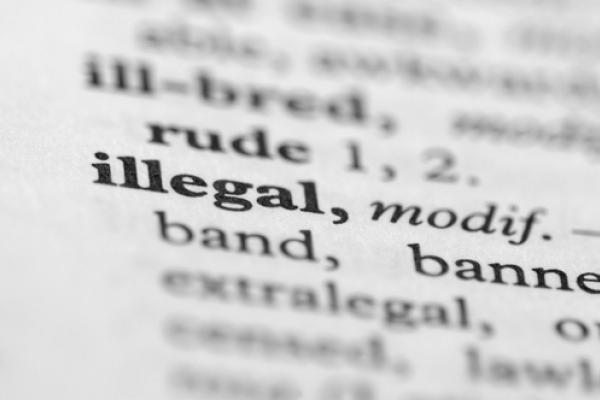 Dictionary Series: Illegal (Shutterstock.com)
