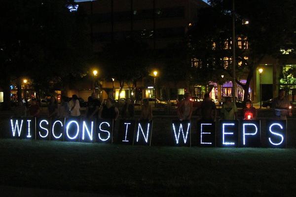 The Overpass Light Brigade at the prayer vigil in Milwaukee. Courtesy Steve Jerb