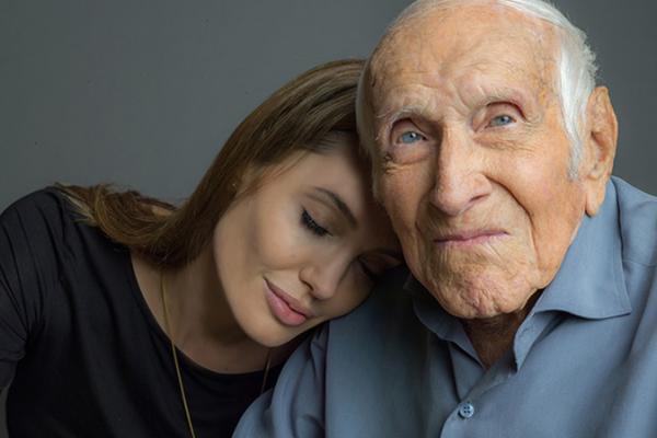 Angelina Jolie with Louis Zamperini. Photo courtesy of Universal / RNS.