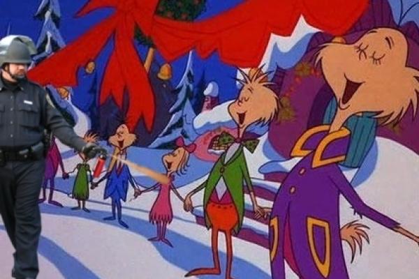 Office Grinch peppersprays the Whos of Whoville. Image via officer-grinch-21501-
