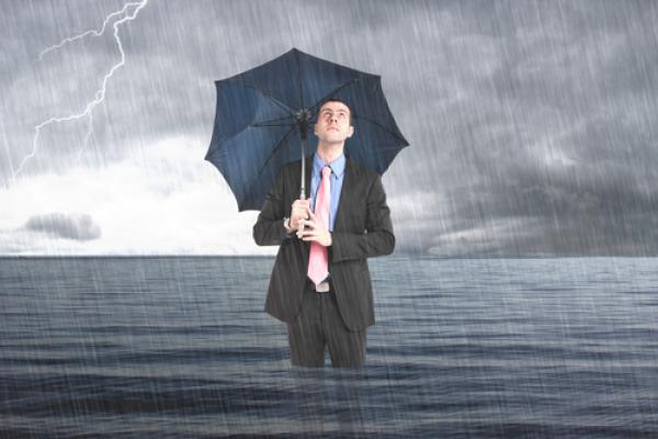 Business man underwater, Minerva Studio / Shutterstock.com