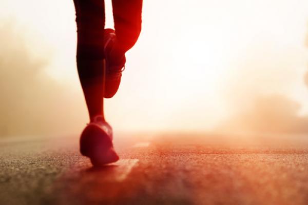 Silhouette of runner, Warren Goldswain / Shutterstock.com