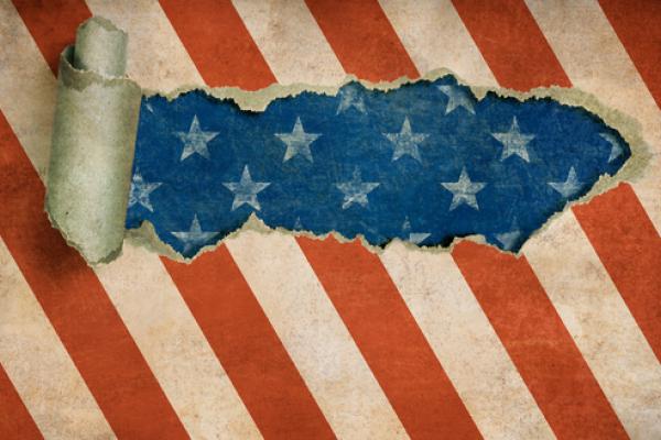 Distressed paper with American flag motif. Photo courtesy Andrey_Kuzmin/shutters