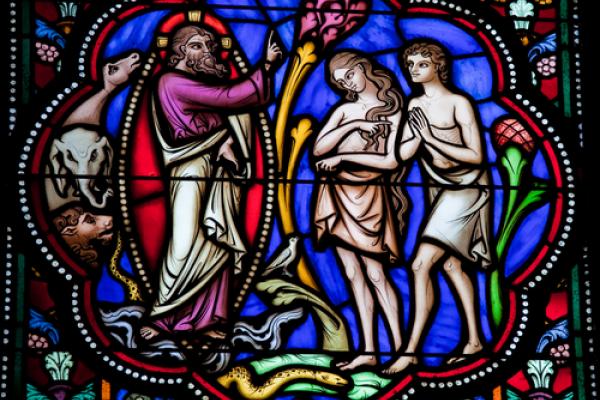 Stained glass window depicting Adam & Eve, jorisvo / Shutterstock.com