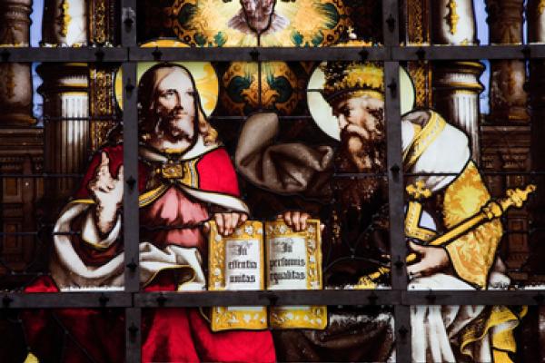 Stained glass window depicting the Holy Trinity, jorisvo / Shutterstock.com