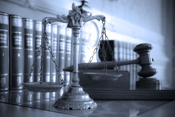 Scales of Justice,  tlegend / Shutterstock.com