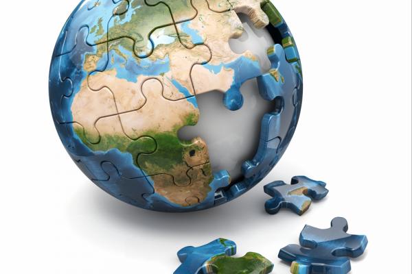 Puzzle of the globe with pieces missing. Image courtesy Maxx-Studio/shutterstock