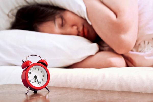 Teen sleeping in, Myimagine / Shutterstock.com