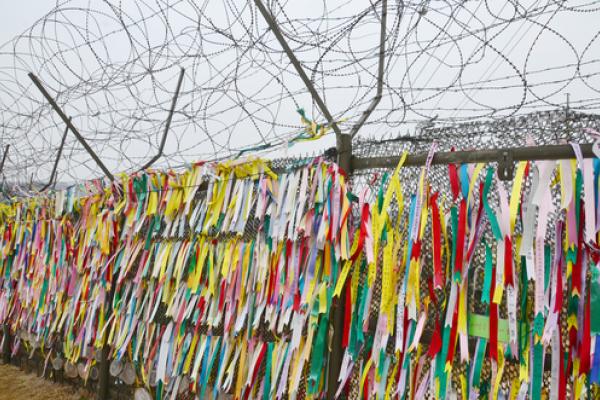 Prayer ribbons hung on the wall in South Korea, meunierd / Shutterstock.com