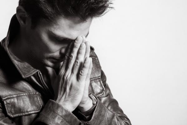 Man praying, KieferPix / Shutterstock.com
