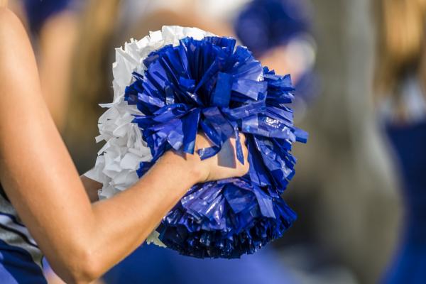 Cheerleaders at the side of the field. Image courtesy CLS Design/shutterstock.co