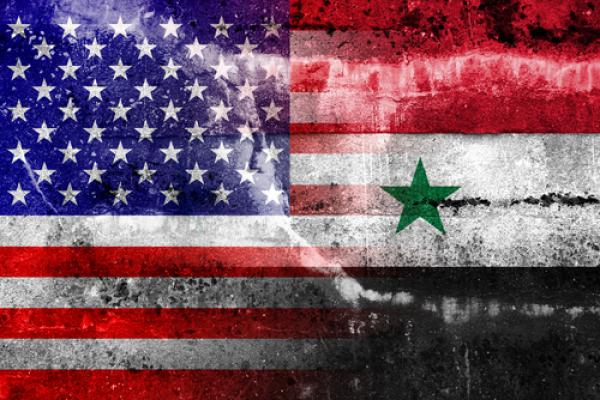 U.S. and Syrian flags, PromesaArtStudio / Shutterstock.com