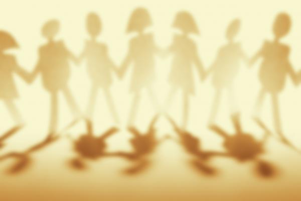 Illustration of community holding hands, STILLFX / Shutterstock.com
