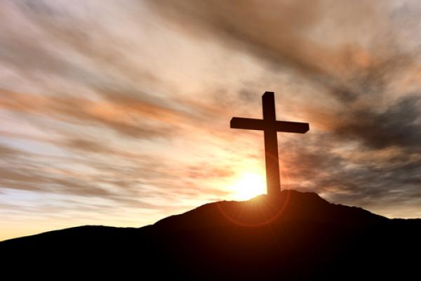 Cross on a hill, Spectral-Design / Shutterstock.com