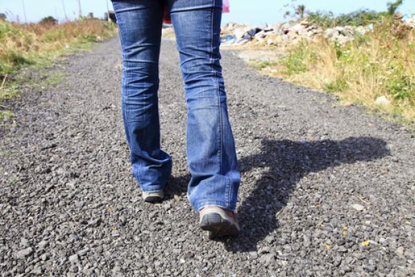 Women walking, rickyd / Shutterstock.com