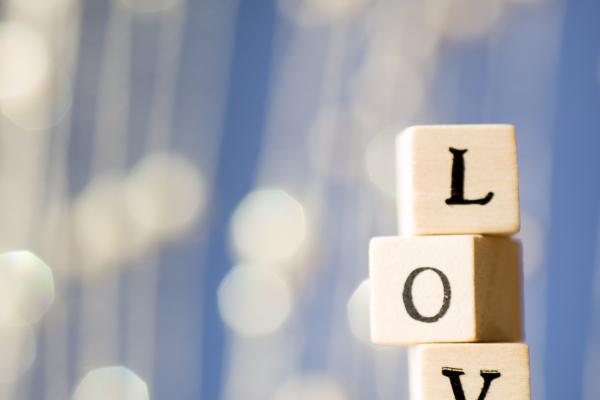 Blocks spelling 'love.' Gita Kulinitch Studio / Shutterstock.com