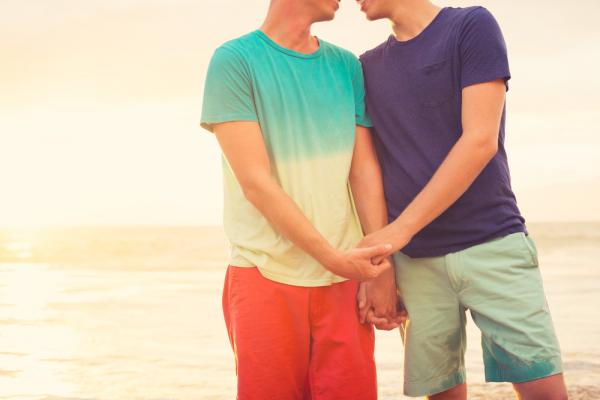 A gay couple holding hands. Image courtesy EpicStockMedia/shutterstock.com