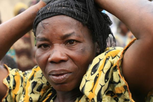 Refugees pass from DR Congo into Uganda in 2008, Sam DCruz / Shutterstock.com