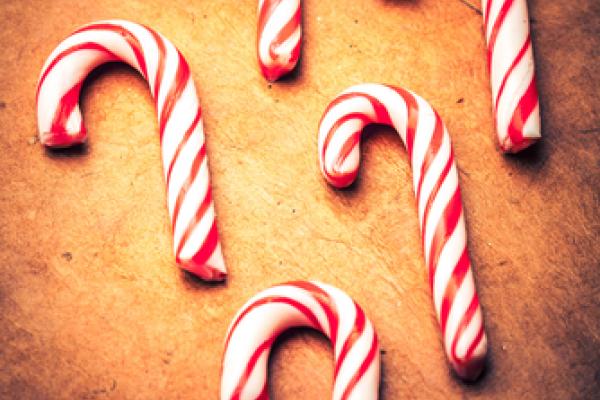 Candy canes on a table. Image courtesy Wilson Araujo/shutterstock.com