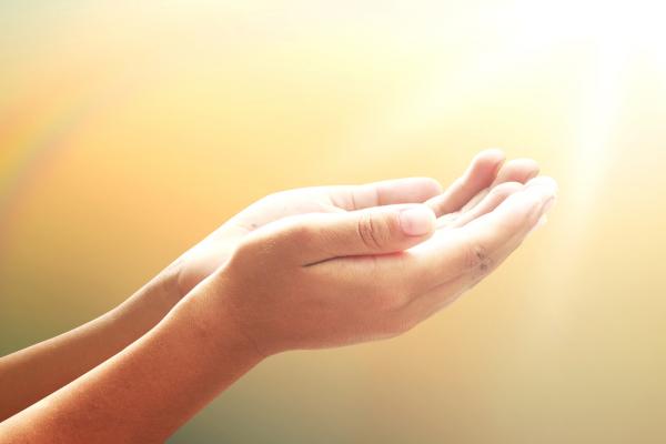 Hands in gratitude. Image courtesy CHOATphotographer/shutterstock.com