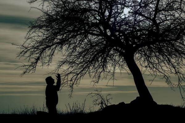 Photo of man praying