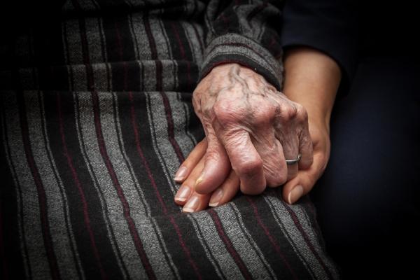 Holding hands in a nursing home
