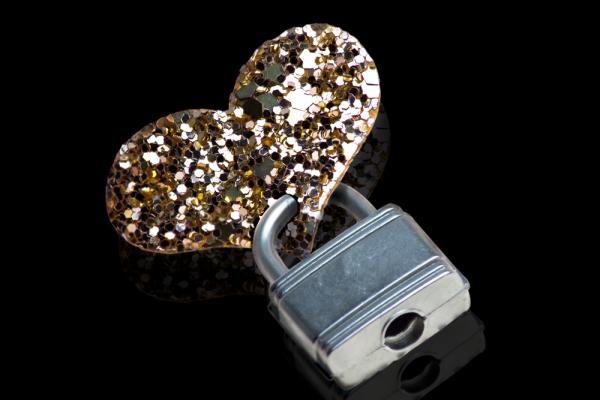 Heart lock and key photo, Paul J. West/Shutterstock.com