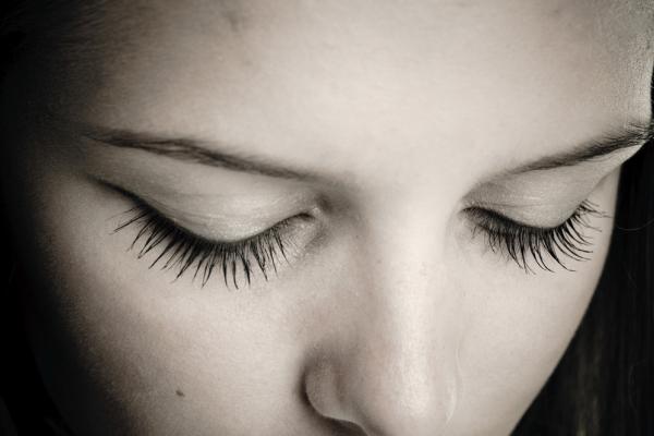 Woman praying, Smirnof/Shutterstock.com