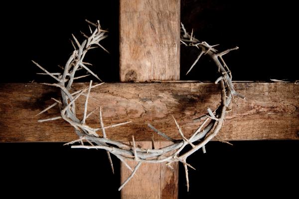 Crown of thorns hung around Easter cross, Anneka/Shutterstock.com
