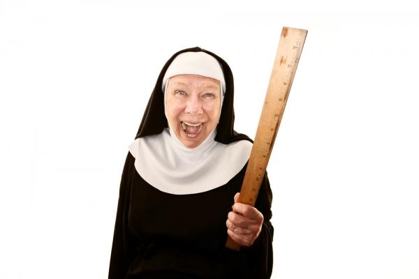Nun image by CREATISTA via Shutterstock.